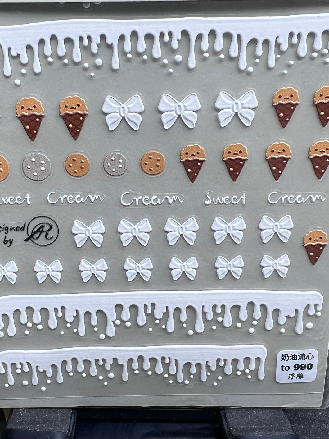 Tomoni stickers to 990